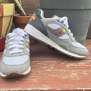 Saucony Gray and White Athletic Shoes with Purple and Yellow Accents